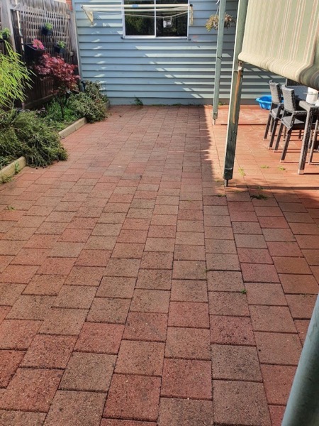 Red brick paving cleaned back to its original colour